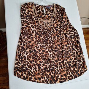 Romans Animal Print top with gold beading at the neckline size 20 w